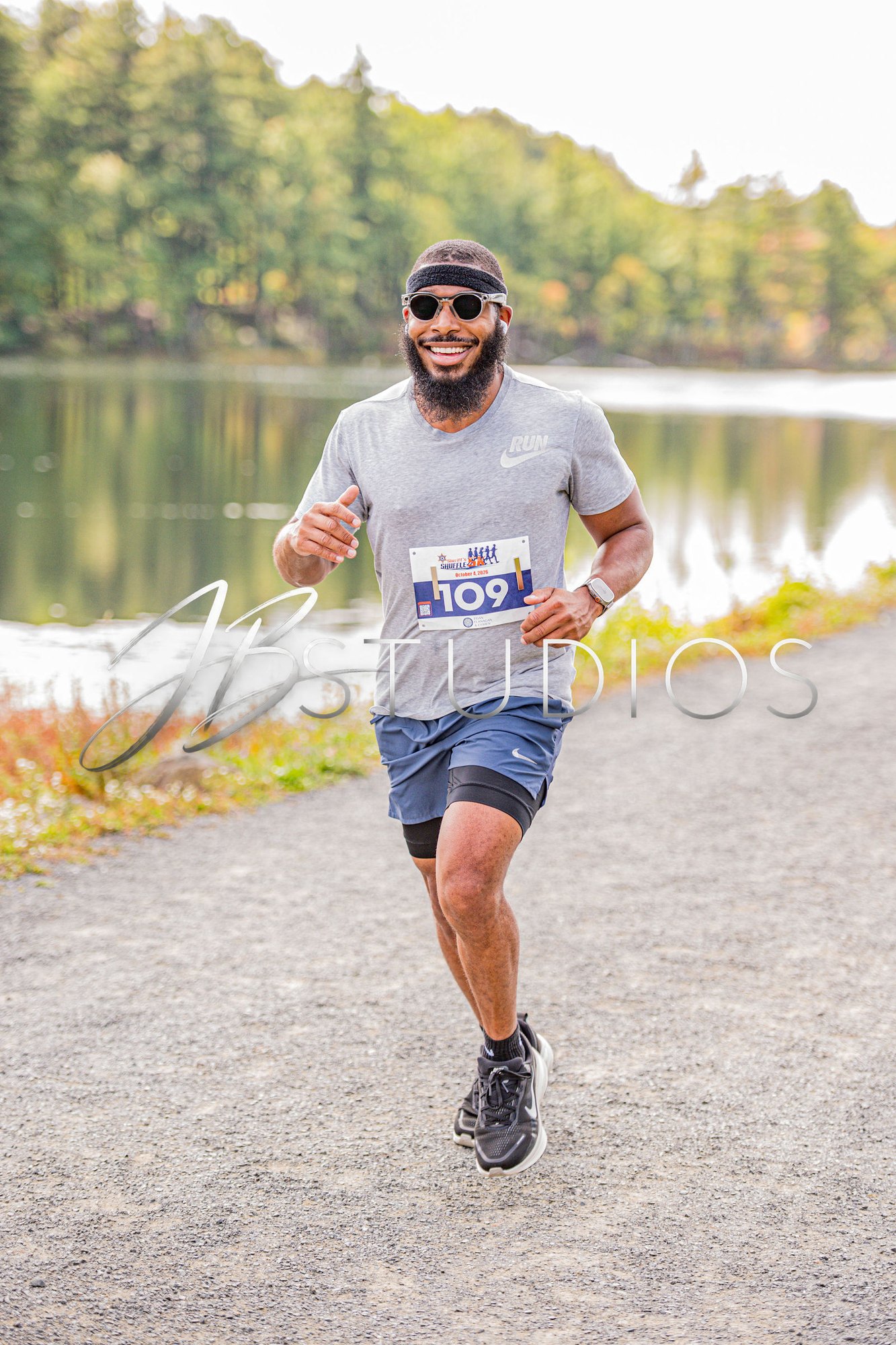 Harrison Grant running beside Ashley Reservoir during the 2026 Sheriff's Shuffle 5K